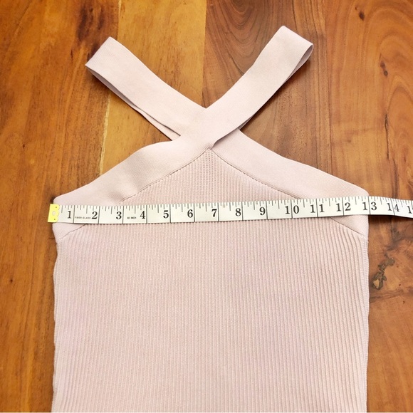 Aritzia BABATON Sculpt Knit Crisscross Tank
Pink Minimalist Contemporary Top. - Picture 7 of 8